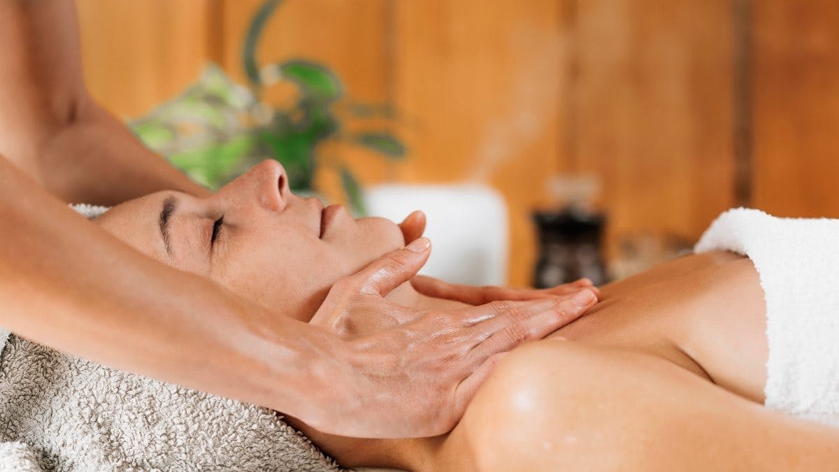 woman getting an ayurvedic massage