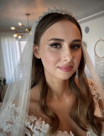 wedding make-up model with brown wavy hair