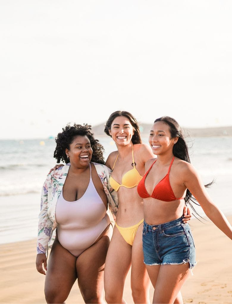 Happy women on the beach