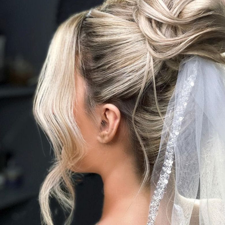 Face-framing curls wedding hair style