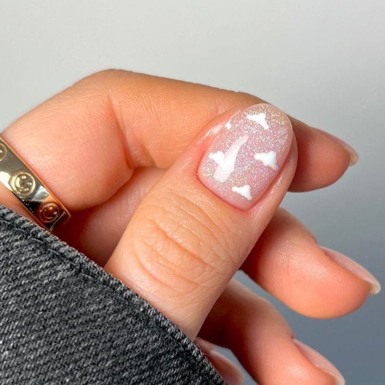 cloud nail art design with glitter