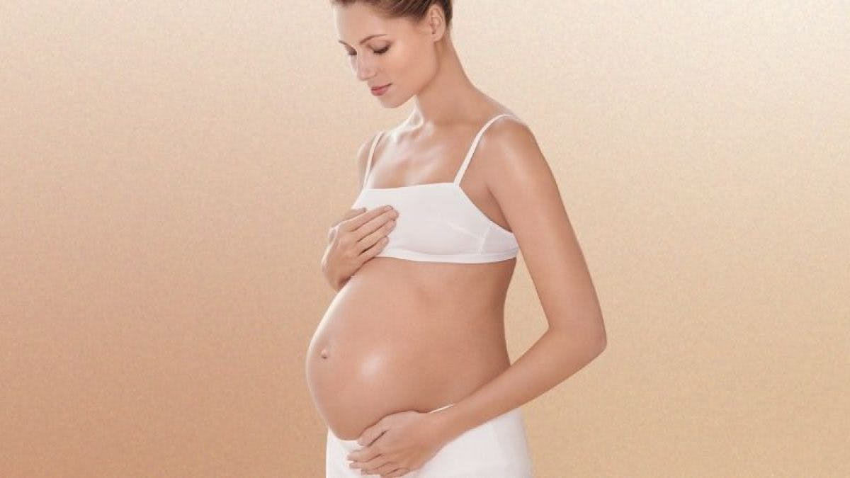 Pregnant Woman with Fake Tan